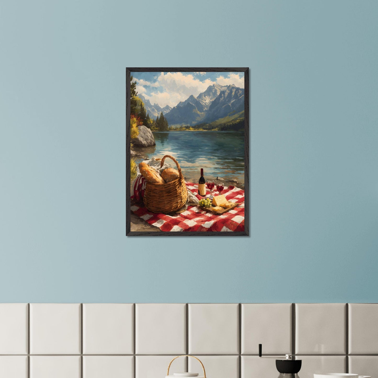 A checkered blanket lies beside a glistening lake, topped with fresh bread, wine, cheese, and grapes. Behind it all, towering mountains create a breathtaking backdrop. The scene celebrates indulgence, nature, and the timeless art of slowing down.