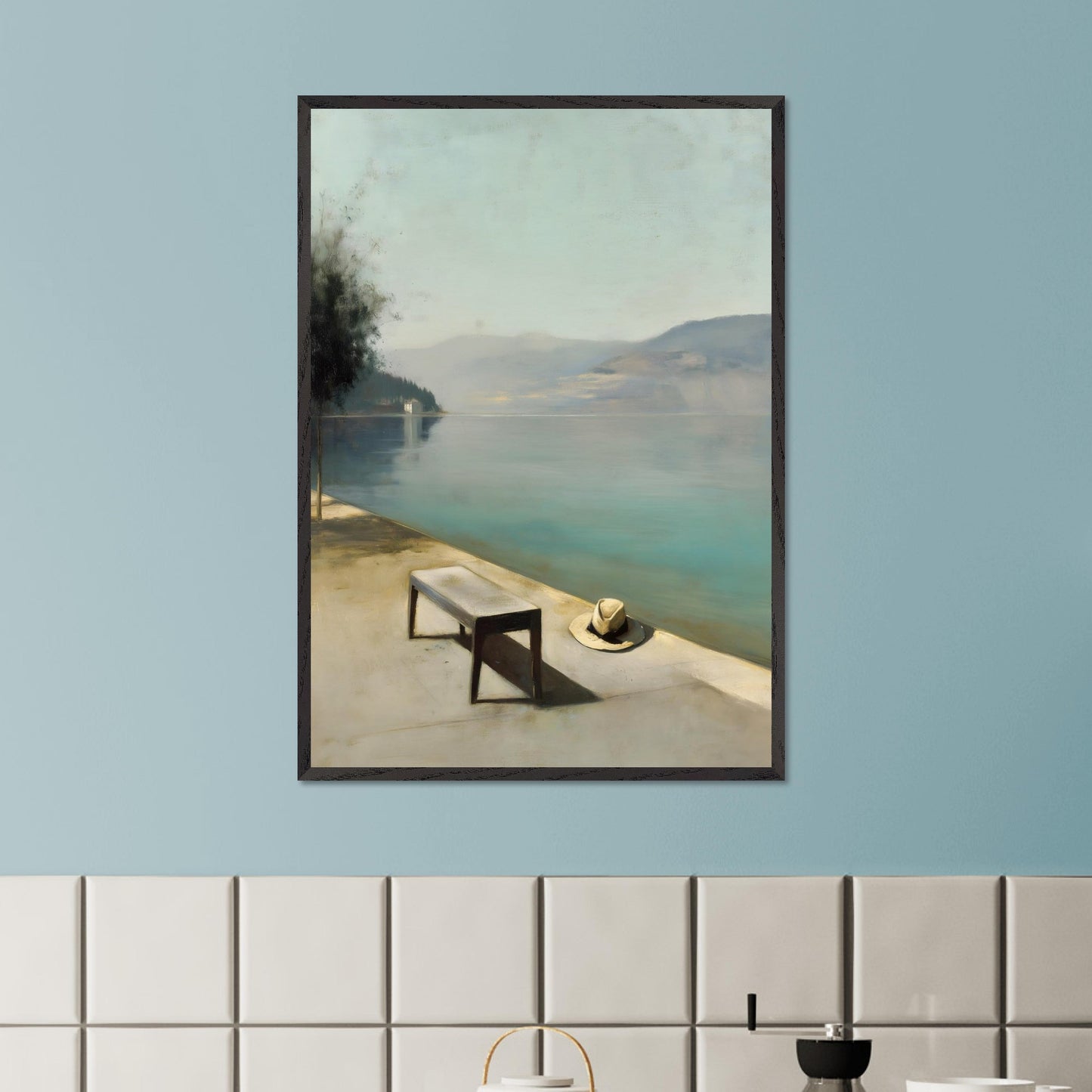 A hat rests beside a bench, left behind or waiting. The water lies smooth as glass, fading into soft mountains and a pale, endless sky. Everything stands still — as if the world paused for breath.