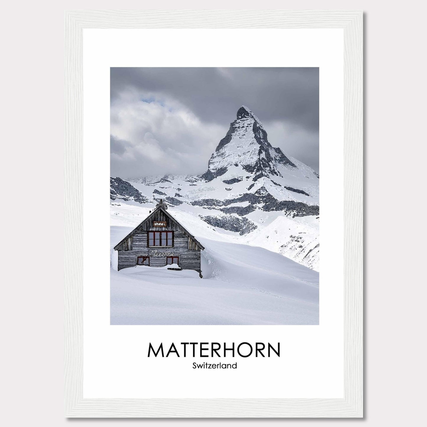 This stunning photograph captures the iconic Matterhorn in Switzerland, with a charming wooden cabin nestled in the snow-covered landscape. The majestic peak rises dramatically against a cloudy sky, creating a breathtaking scene of natural beauty.