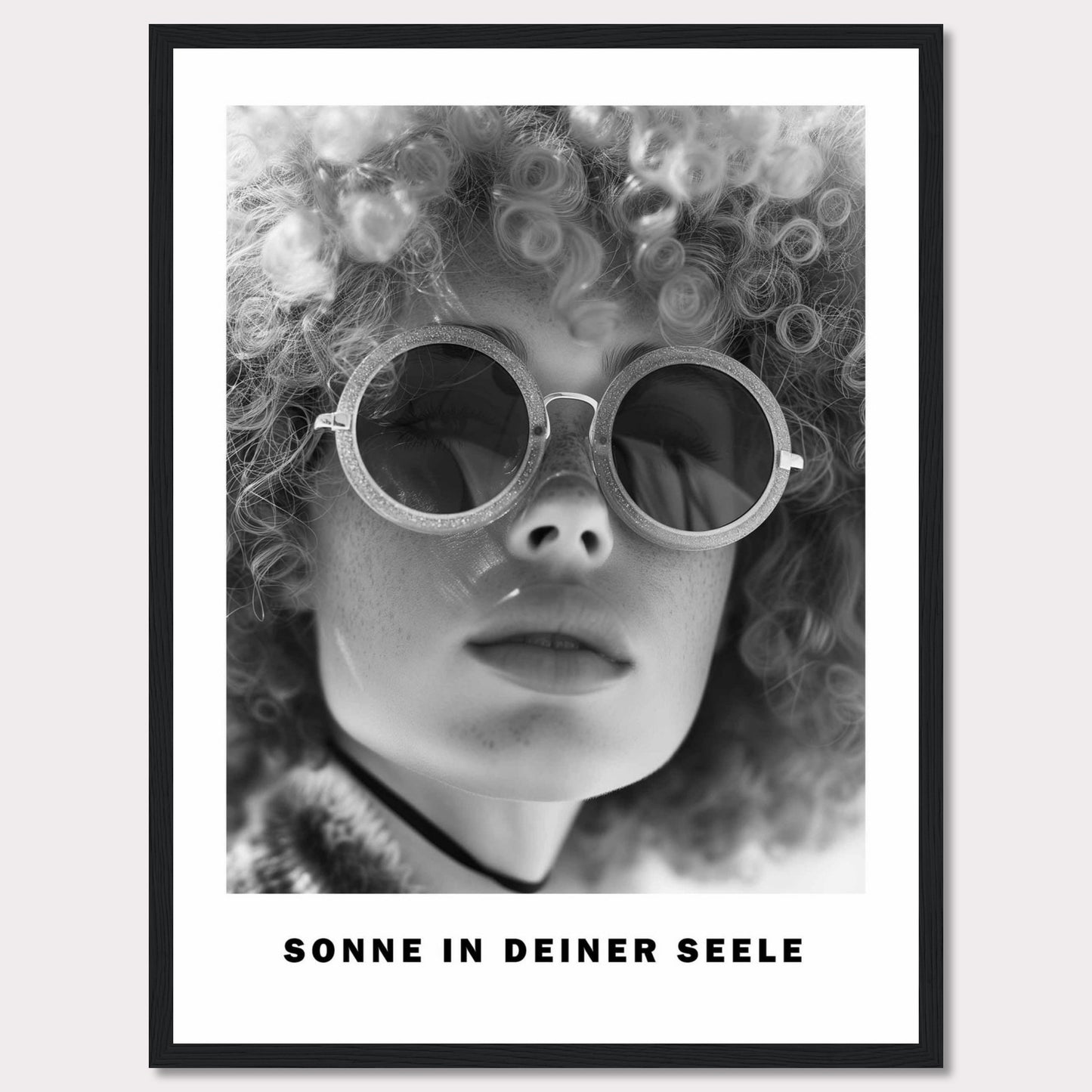 This black-and-white poster features a close-up of a person with curly hair wearing round sunglasses. The text at the bottom reads "SONNE IN DEINER SEELE," which translates to "Sun in Your Soul."