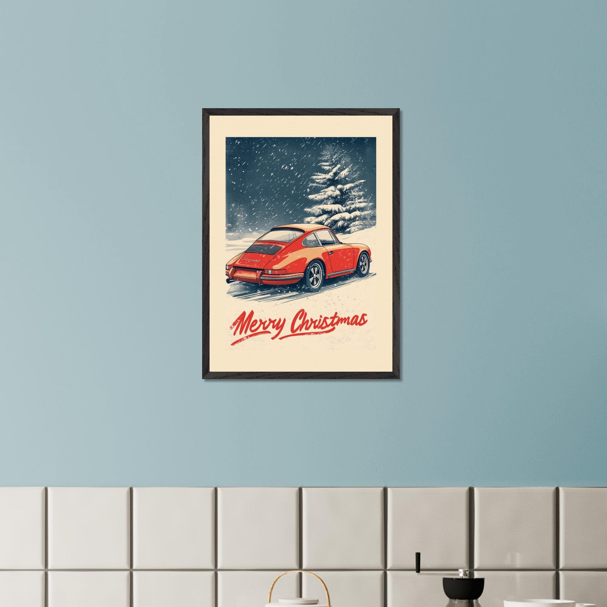 This nostalgic holiday poster features a striking red Porsche driving through a snow-covered landscape, with festive snowflakes gently falling around the scene. A snowy tree and soft winter hues create a cozy and festive atmosphere. The bold "Merry Christmas" typography adds an extra touch of holiday cheer, making it a perfect way to celebrate the season with a classic car enthusiast's touch.