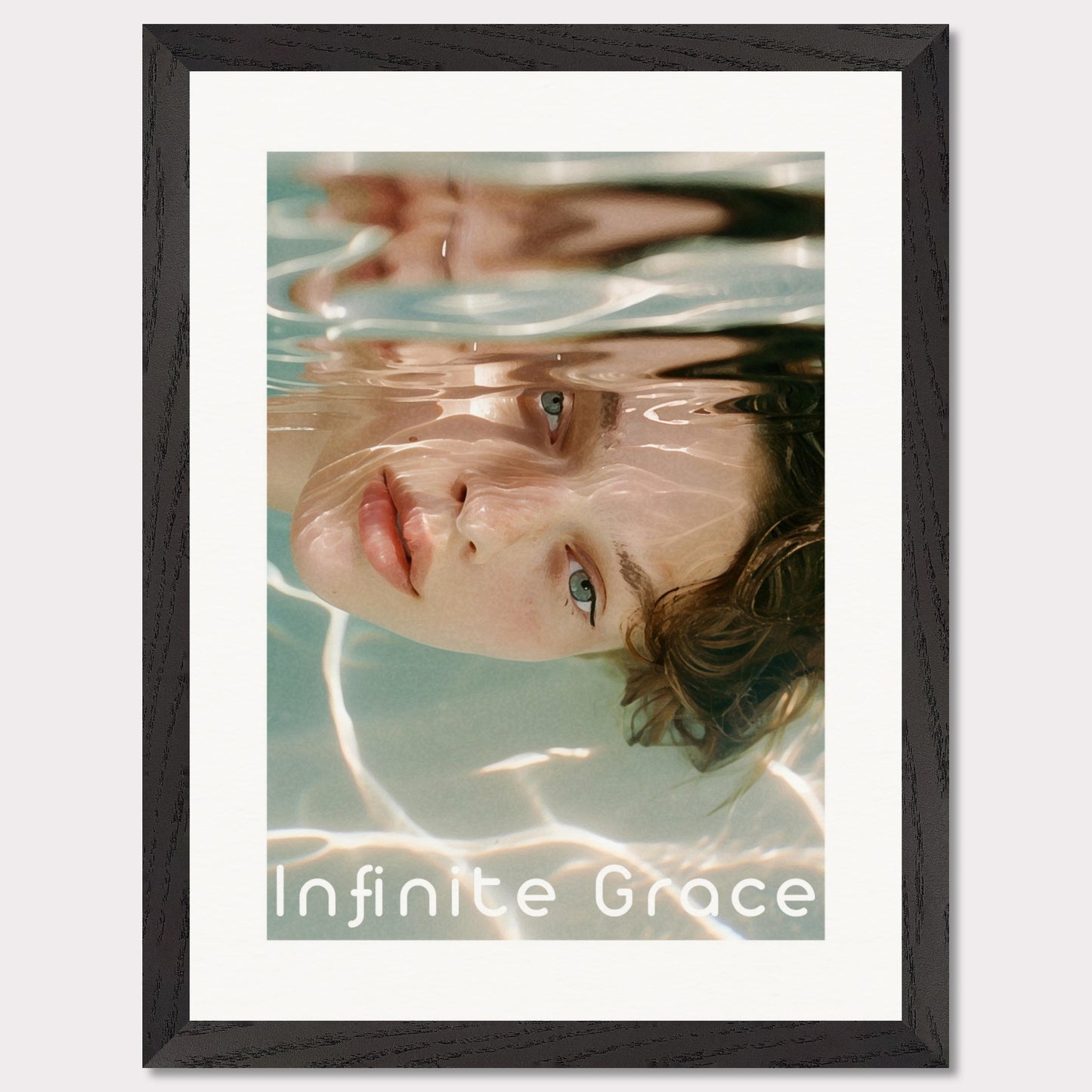 This is an illustration of a person's face partially submerged in water, creating a reflective and serene effect. The text "Infinite Grace" is displayed at the bottom of the image.

Where will this poster fit: This poster would fit well in a modern living room, a bedroom, or a creative studio space.