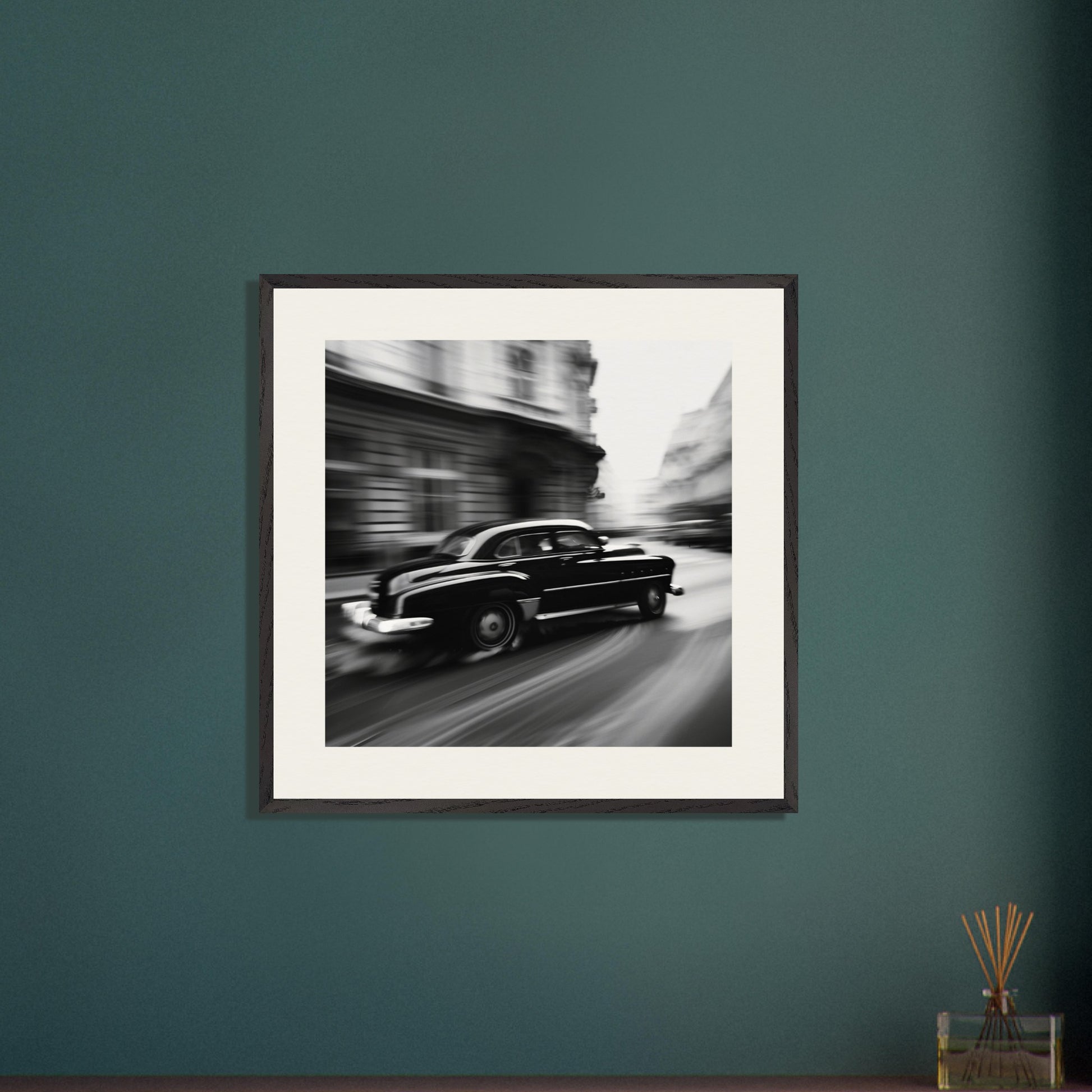 This illustration depicts a black vintage car speeding through a city street, with buildings blurred in the background to convey motion.