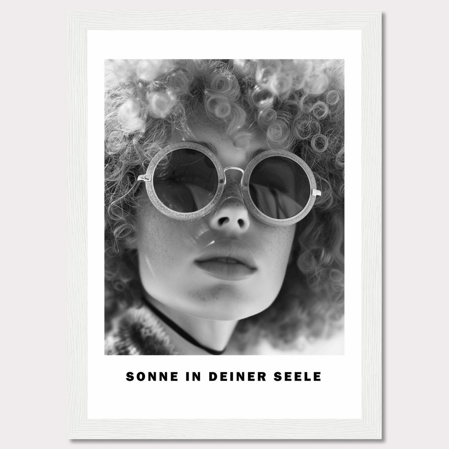 This black-and-white poster features a close-up of a person with curly hair wearing round sunglasses. The text at the bottom reads "SONNE IN DEINER SEELE," which translates to "Sun in Your Soul."