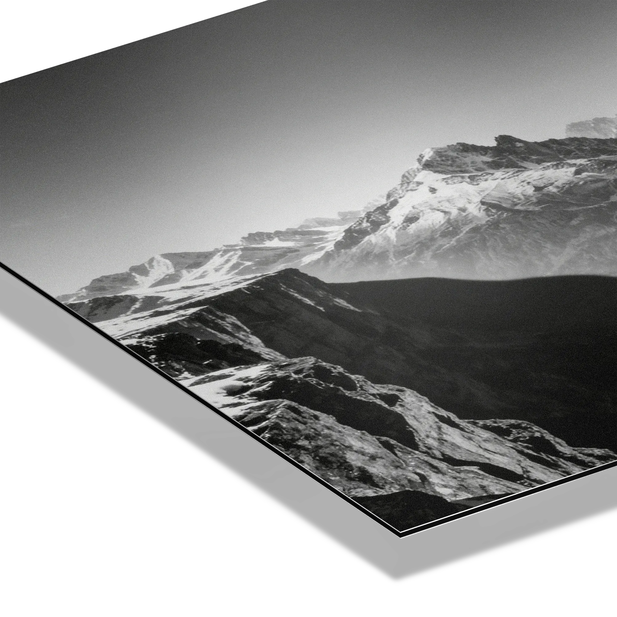 Alpine Ibex Horizon – Alu-Dibond wall art showcasing a dramatic mountain cliff in stunning black-and-white detail.