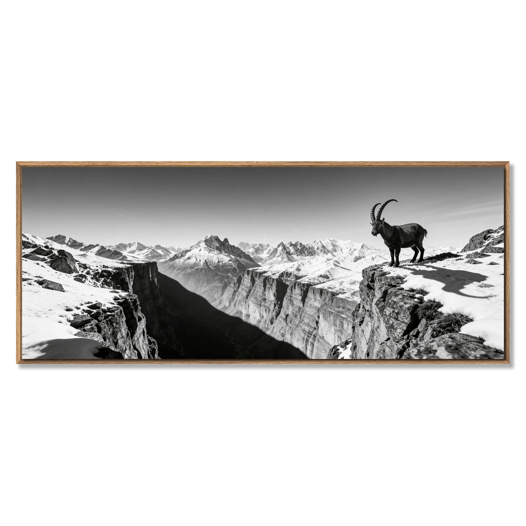 Alpine Ibex Horizon – Alu-Dibond wall art featuring a majestic ibex at a mountain cliff overlook.