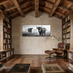 Alpine Cow Watch – Alu-Dibond wall art displayed in a cozy library, featuring a group of alpine cows in foggy landscape.