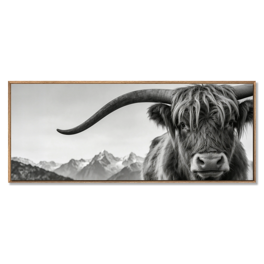 Alpine Horned Beauty – Alu-Dibond wall art featuring a close-up of a majestic Alpine cow against a misty mountain backdrop.