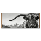 Alpine Horned Beauty – Alu-Dibond wall art featuring a close-up of a majestic Alpine cow against a misty mountain backdrop.