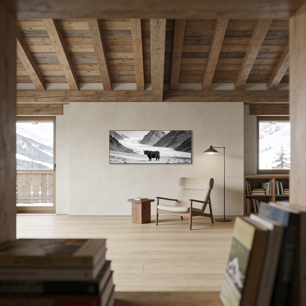 Black Cow Passage – Alu-Dibond wall art displayed in a cozy alpine living room with wooden beams.