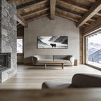 Black Cow Passage – Alu-Dibond wall art displayed in a wooden living room, featuring a serene alpine landscape.