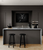 Character of a goat - Alu-Dibond wall art displayed in a modern kitchen with black stools and a stylish decor.