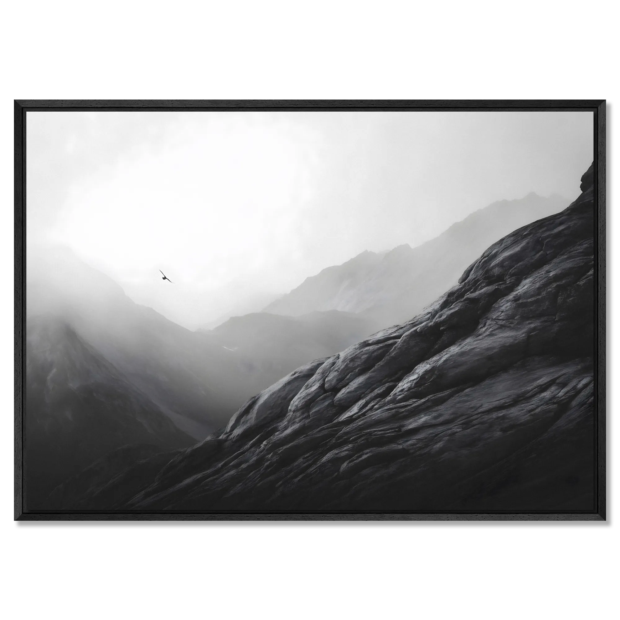 Flight over the Alps – Alu-Dibond wall art showcasing a lone bird gliding over misty mountain peaks.