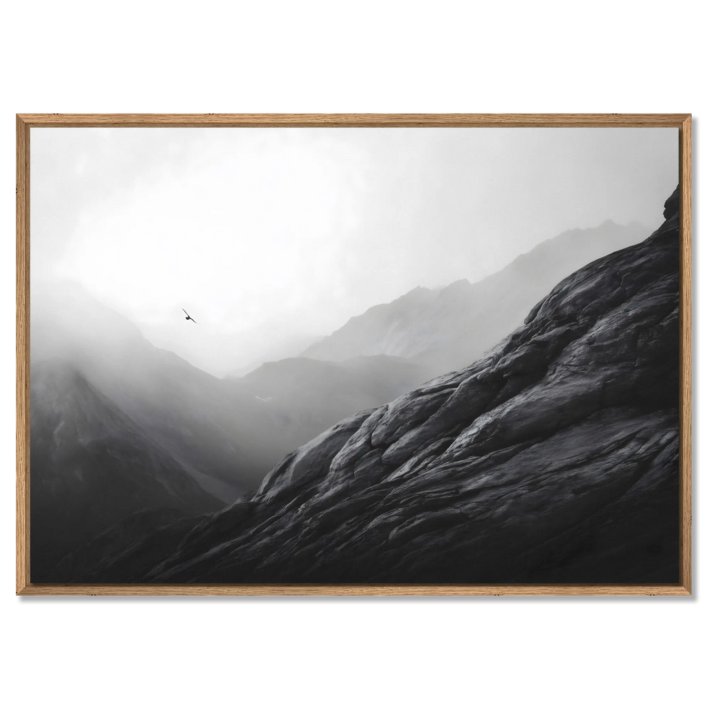 Flight over the Alps – Alu-Dibond wall art depicting a bird soaring above misty alpine mountains.