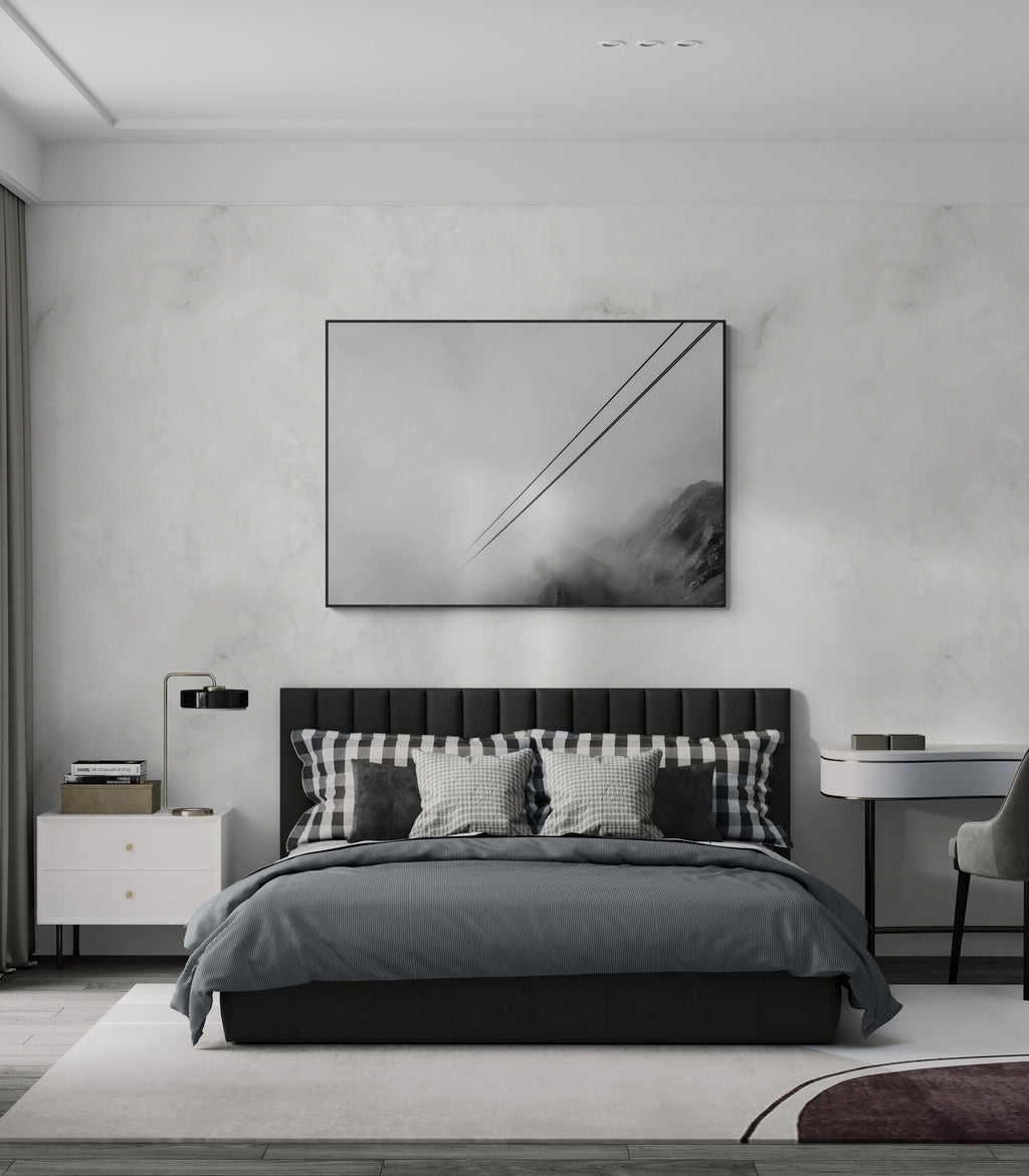 Lines Above the Alps – Alu-Dibond wall art displayed above a modern bed in a stylish bedroom.