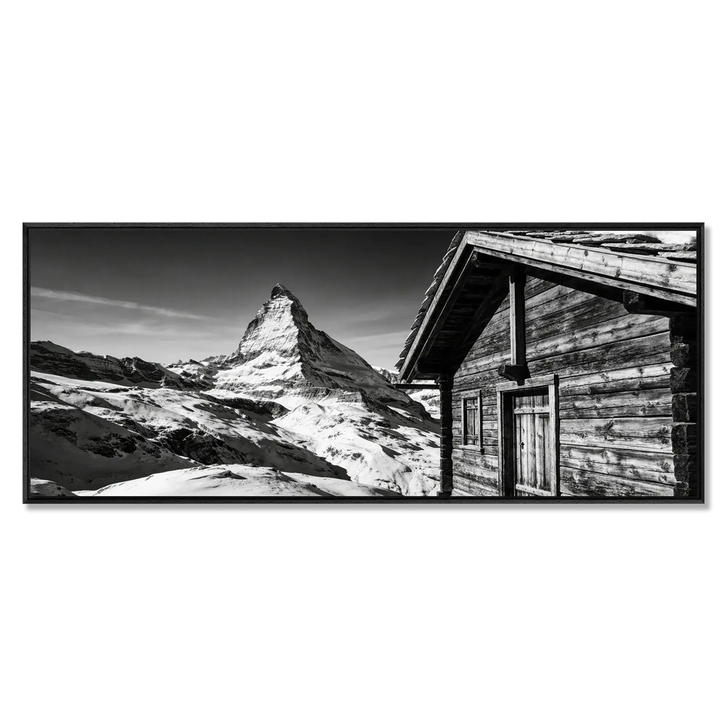 Matterhorn Chalet View – Alu-Dibond wall art featuring a wooden chalet and Matterhorn in black and white.