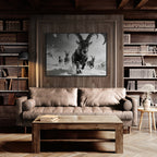 The Running Ibex – Alu-Dibond wall art displayed above a cozy sofa in a rustic interior.