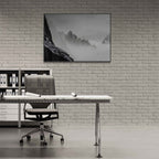 Above the Clouds – Alu-Dibond wall art showcasing serene alpine peaks in a modern office setting.