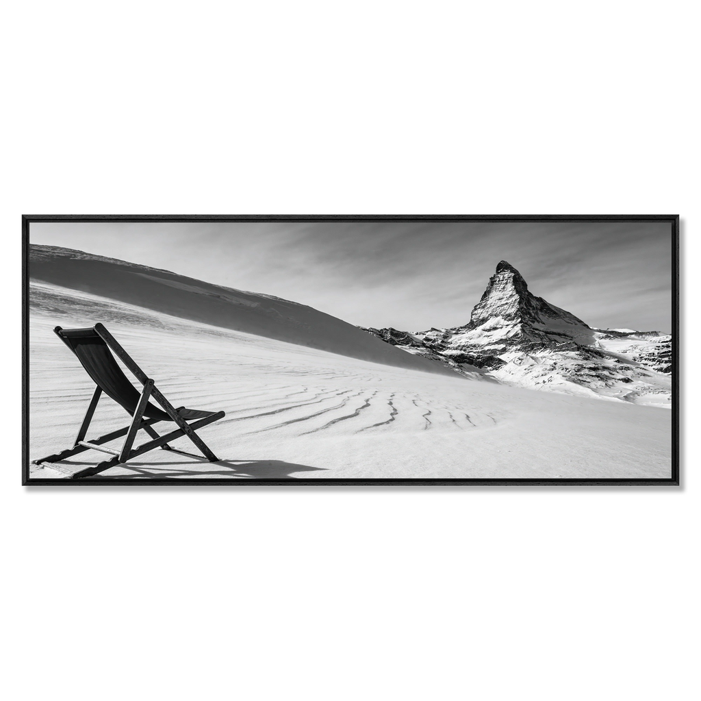 After the Descent, Matterhorn – Alu-Dibond wall art showing a deck chair on a snowy slope with the Matterhorn in the background.