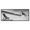 After the Descent, Matterhorn – Alu-Dibond wall art showing a deck chair on a snowy slope with the Matterhorn in the background.