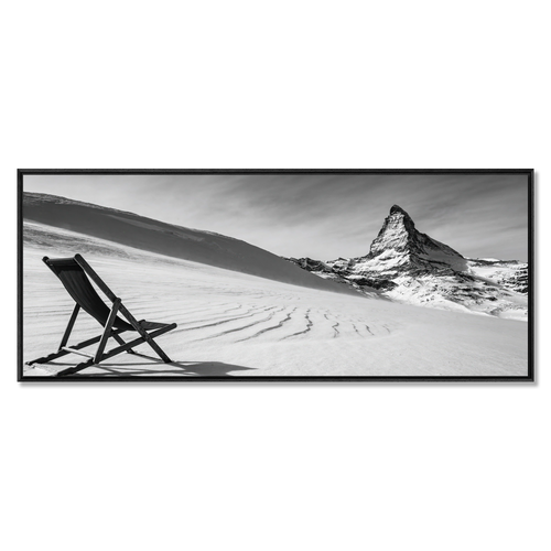 After the Descent, Matterhorn – Alu-Dibond wall art showing a deck chair on a snowy slope with the Matterhorn in the background.