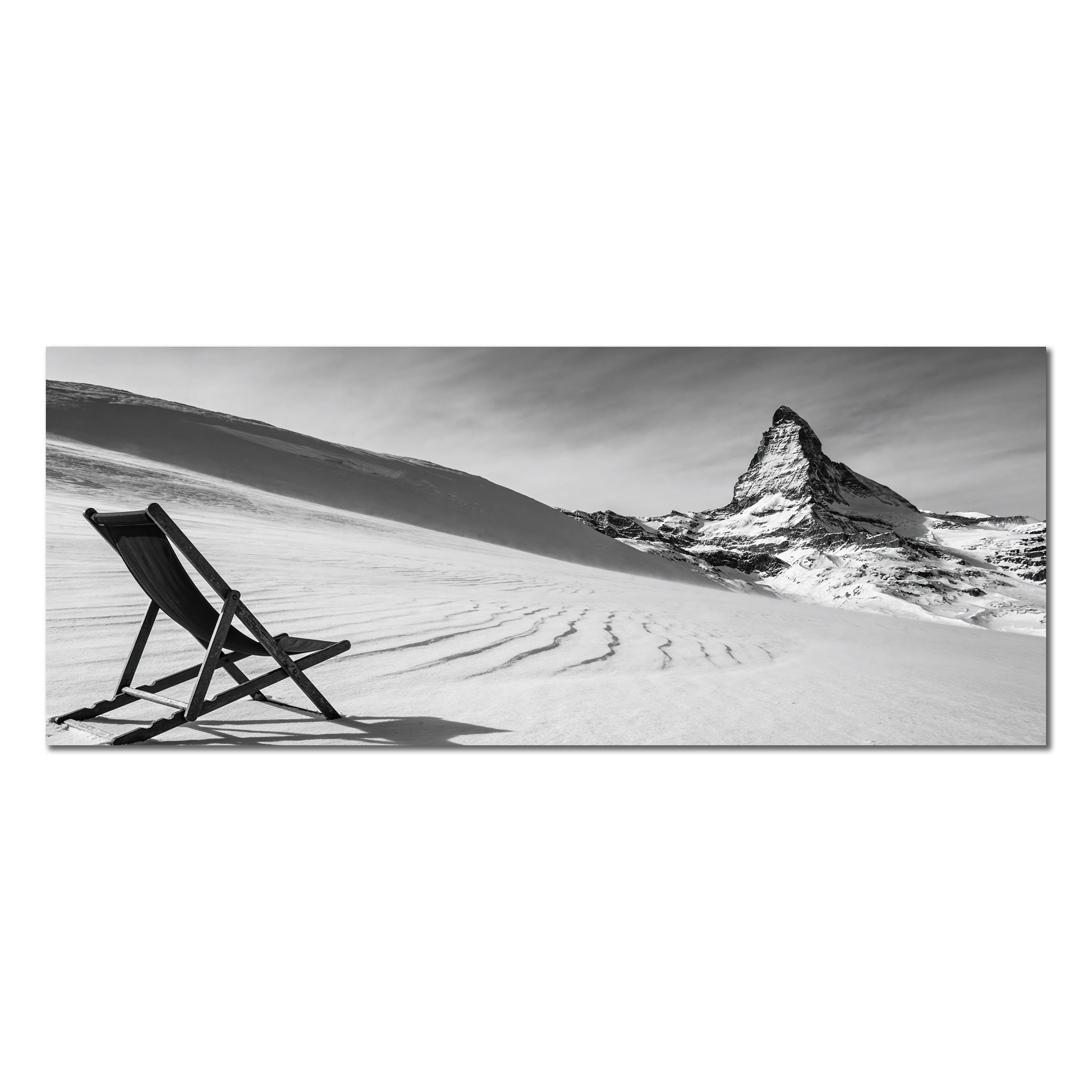 After the Descent, Matterhorn – Alu-Dibond wall art featuring a deck chair on a snowy slope with the Matterhorn in the background.