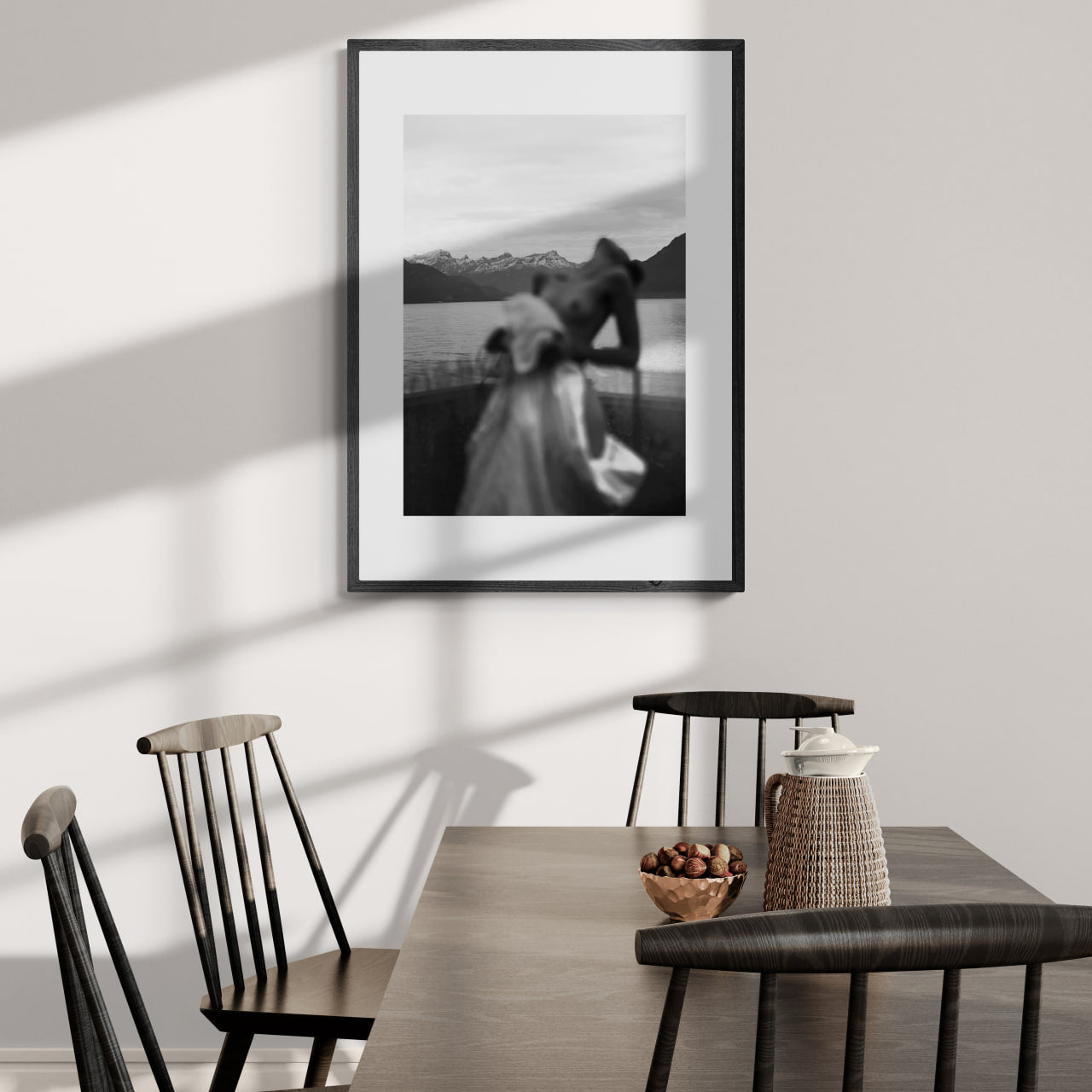 Alpine Silhouette - Poster featuring a blurred silhouette of a woman by a mountain lake, capturing wall art elegance.