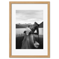 Alpine Silhouette - Poster featuring a blurred silhouette of a woman with snowy mountains and a lake in black and white.