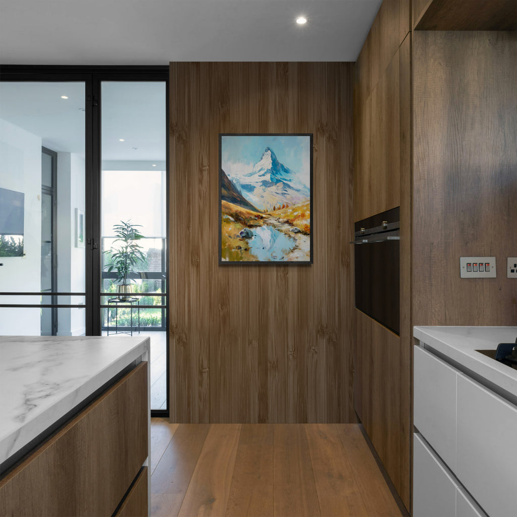 Alps Reflection - Poster displayed in a modern kitchen with wood accents, showcasing a bright alpine landscape and serene water reflection.