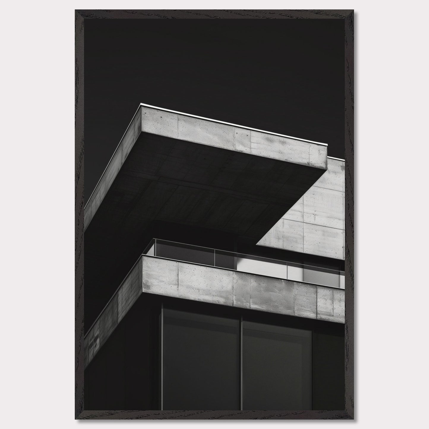 This striking black and white photograph captures the modern architectural lines of a concrete building against a dark background. The image highlights the stark contrast and geometric precision of contemporary design.