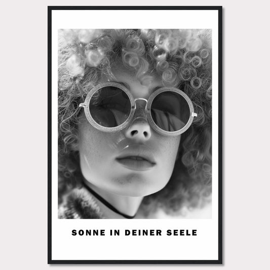 This black-and-white poster features a close-up of a person with curly hair wearing round sunglasses. The text at the bottom reads "SONNE IN DEINER SEELE," which translates to "Sun in Your Soul."