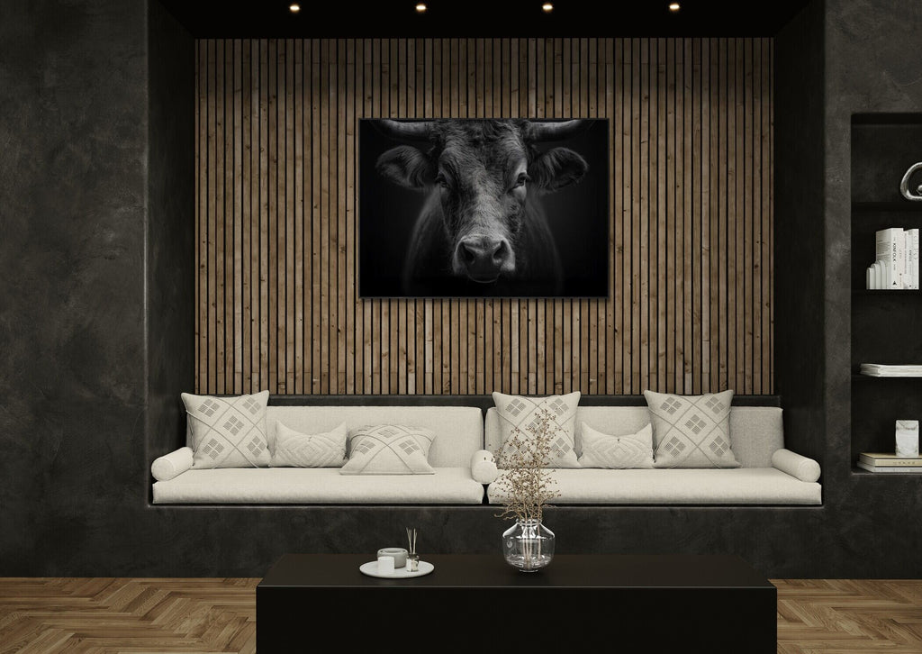 Presence of a bull - Alu-Dibond wall art displayed in a modern living room with elegant decor.