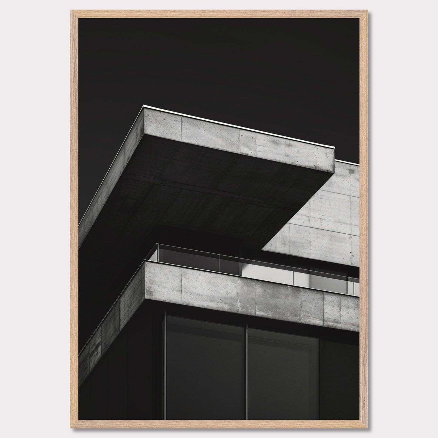 This striking black and white photograph captures the modern architectural lines of a concrete building against a dark background. The image highlights the stark contrast and geometric precision of contemporary design.