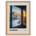 Chamonix - Gateway to the Mont Blanc Massif - Poster showcasing a sunrise view through a frosted train window.