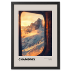 Chamonix - Gateway to Mont Blanc - Poster showcasing sunrise view through a train window with snowy mountains.