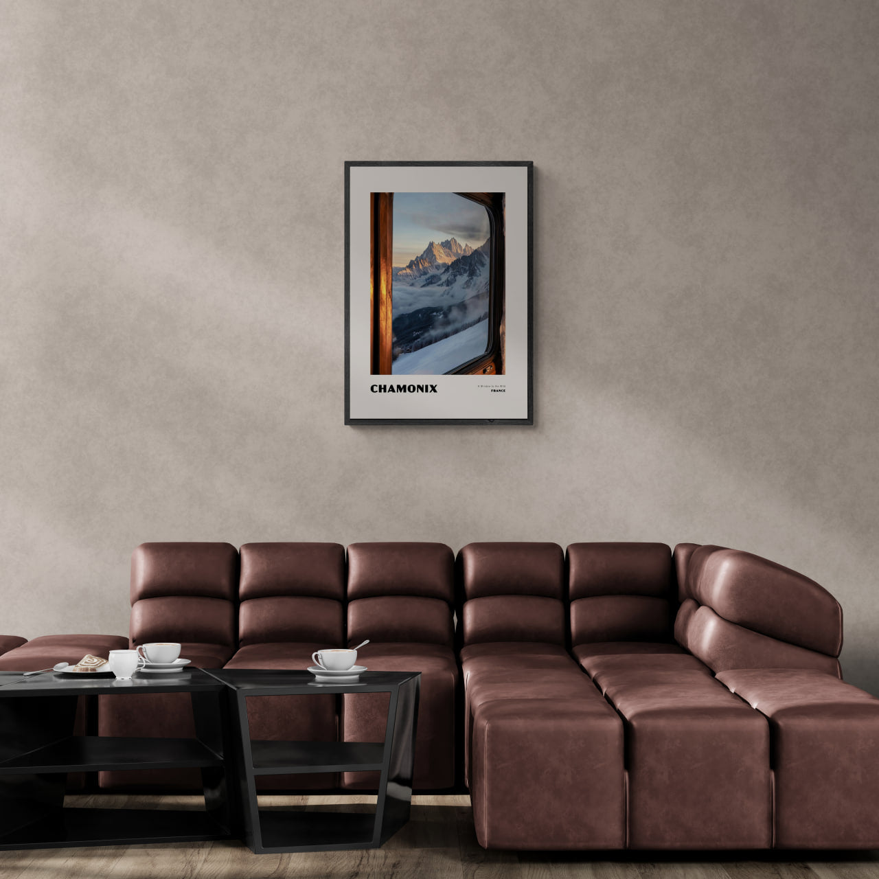 Chamonix - A Window to the Wild - Poster framed on wall above modern brown couch in stylish living room.