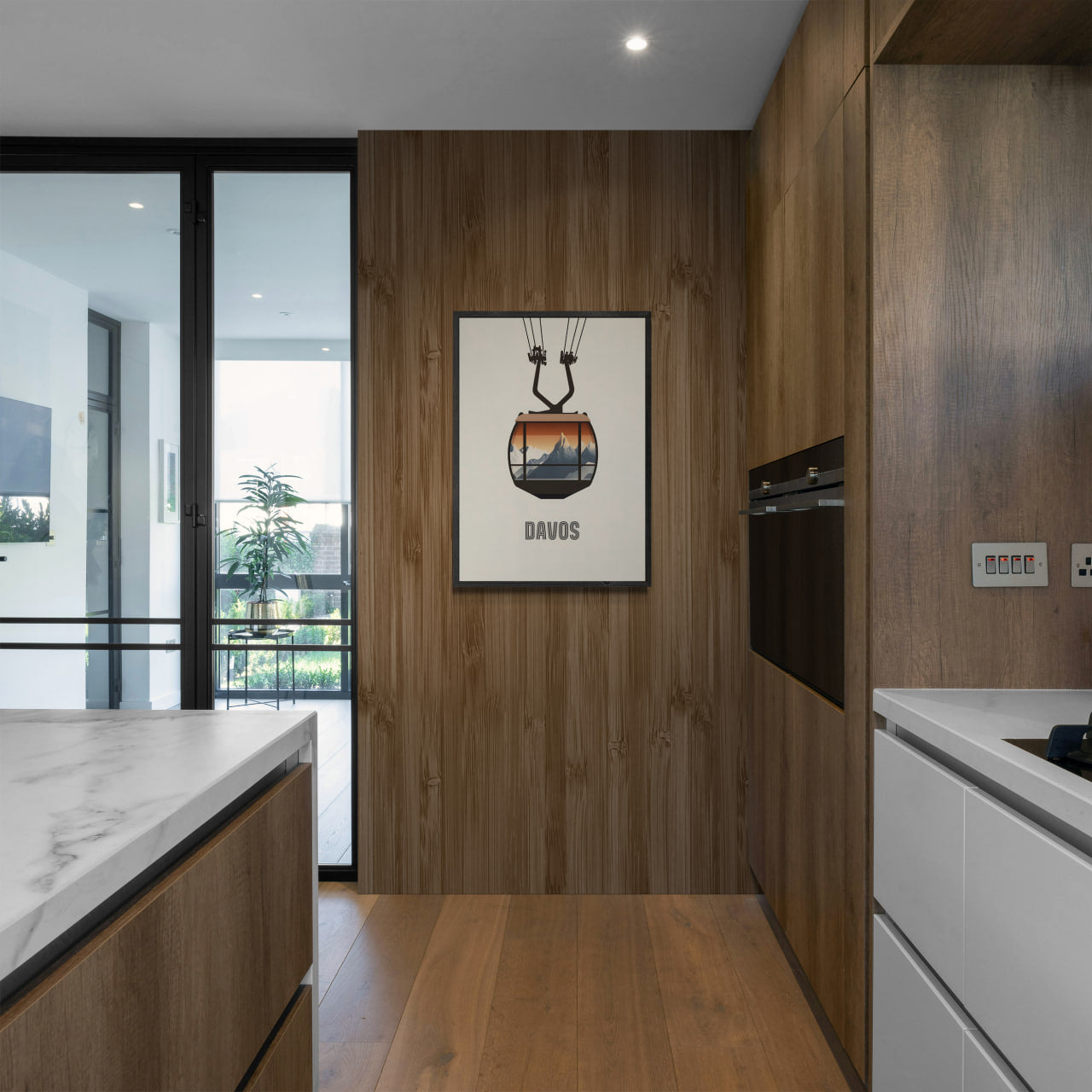 Davos – Cable Car Journey - Poster displayed in a modern kitchen with wooden accents.