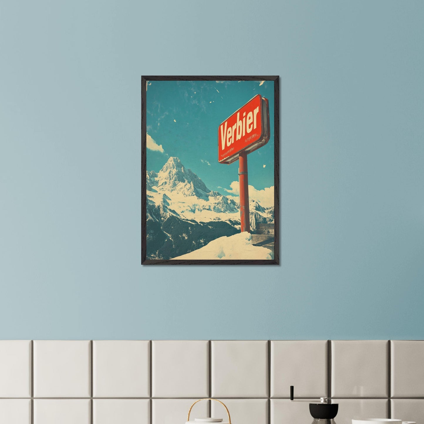 This striking retro-style poster showcases the iconic "Verbier" sign against the backdrop of towering snow-covered peaks and a bright blue sky. The rustic sign, partially worn by time, perfectly complements the expansive, untouched wilderness of the Swiss Alps. The vintage color palette and texture evoke a sense of nostalgia, capturing the allure of Verbier as a timeless destination for adventure and escape into nature’s beauty.