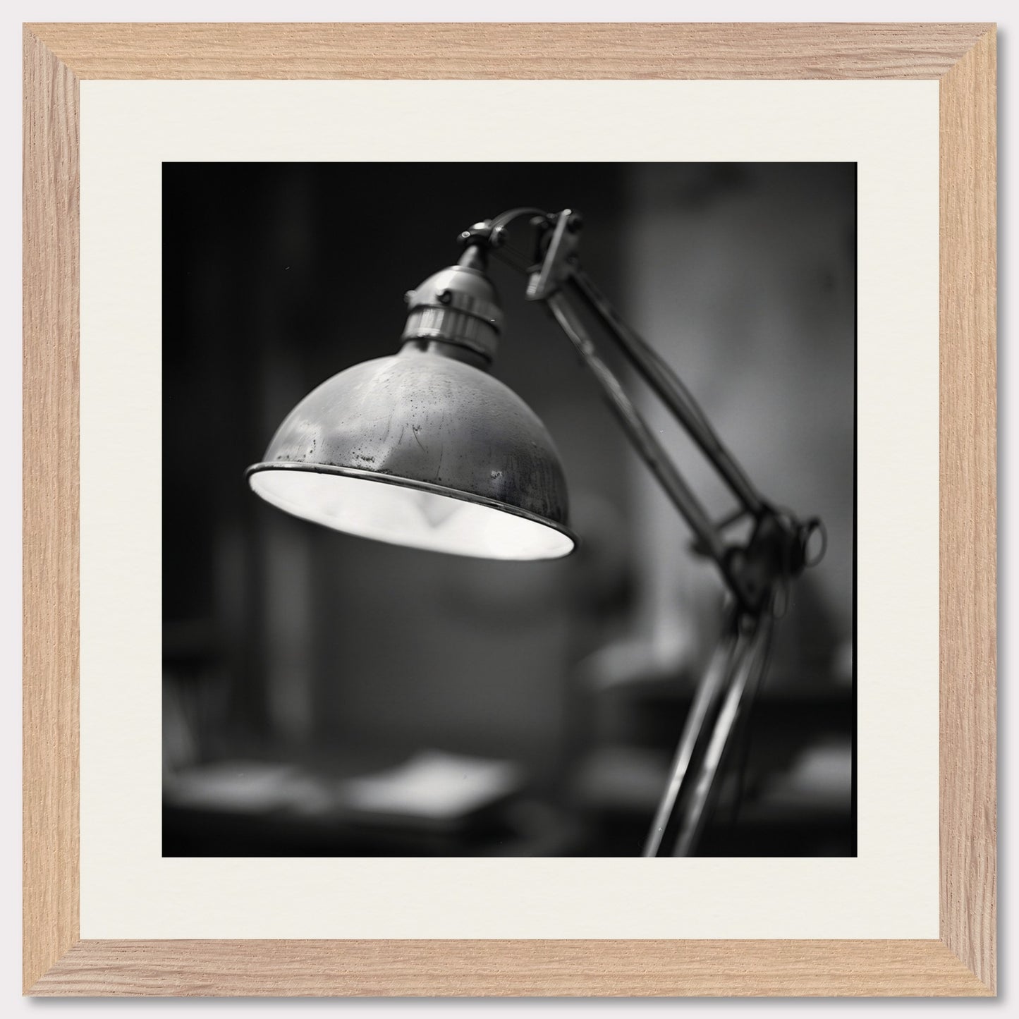 This illustration shows a black and white image of a vintage desk lamp with a metal shade.