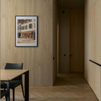 Gstaad – Fashion in the Alps - Poster displayed in a modern minimalist interior with wooden walls and warm tones.