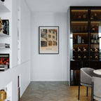 Gstaad – Luxury Shopping District - Poster displayed in modern interior design, featuring sleek shelves and a wine cabinet.