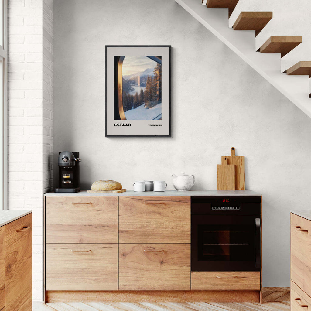 Gstaad - Where Nature Meets Elegance - Poster displayed in a modern kitchen setting, showcasing serene winter landscape.