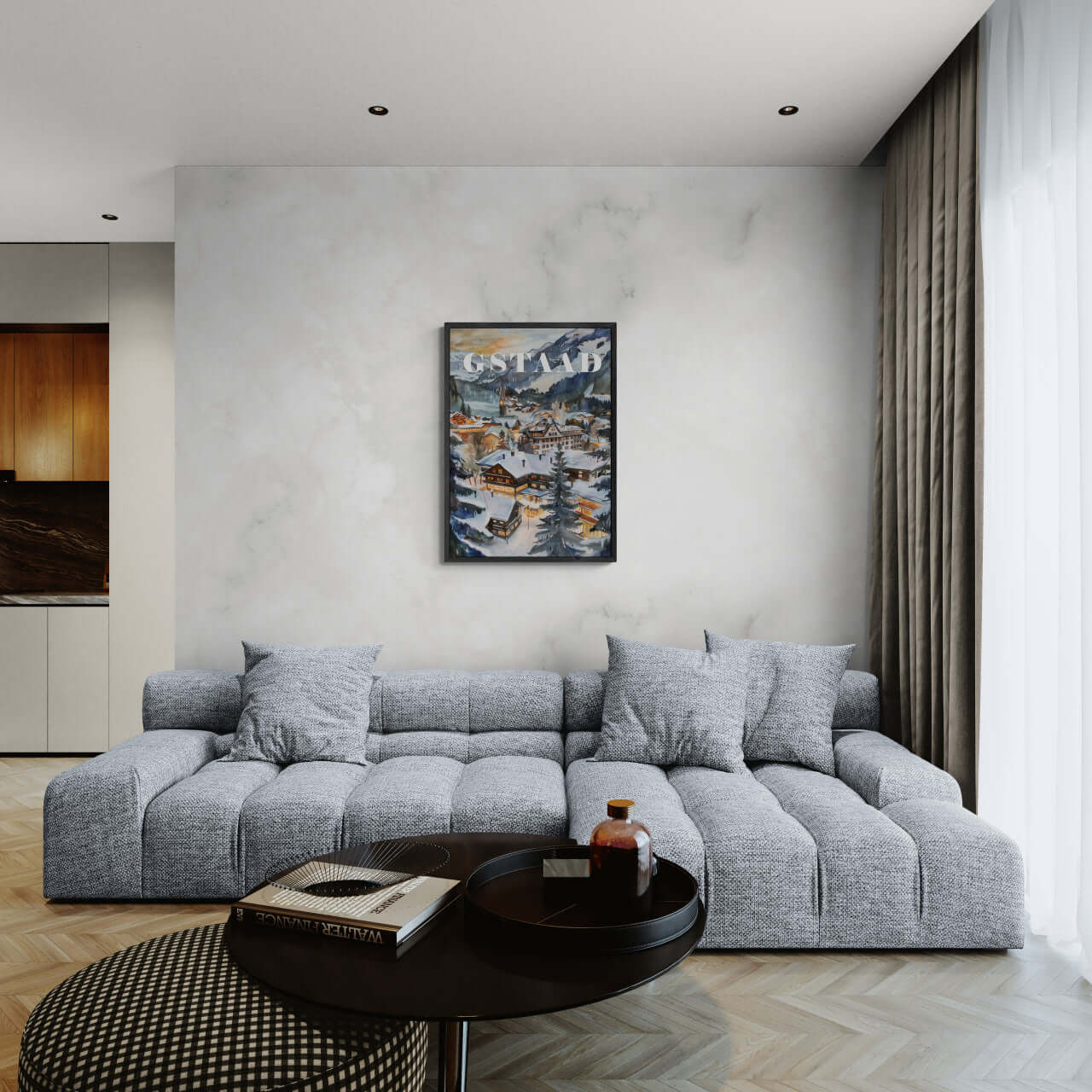 Gstaad - Poster displayed above a modern couch in a stylish living room, showcasing snowy alpine scenery.