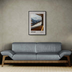 Gstaad - A Window to the Past, Calling You Back- Poster displayed above a modern sofa in a minimalist living room.