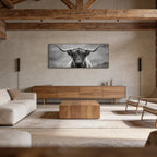 Highland Guardian – Alu-Dibond wall art featuring a Highland cow in a stylish living room.