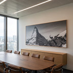 Ibex Before the Matterhorn showcased as Large-Scale Alpine Wall Art in a modern conference room.