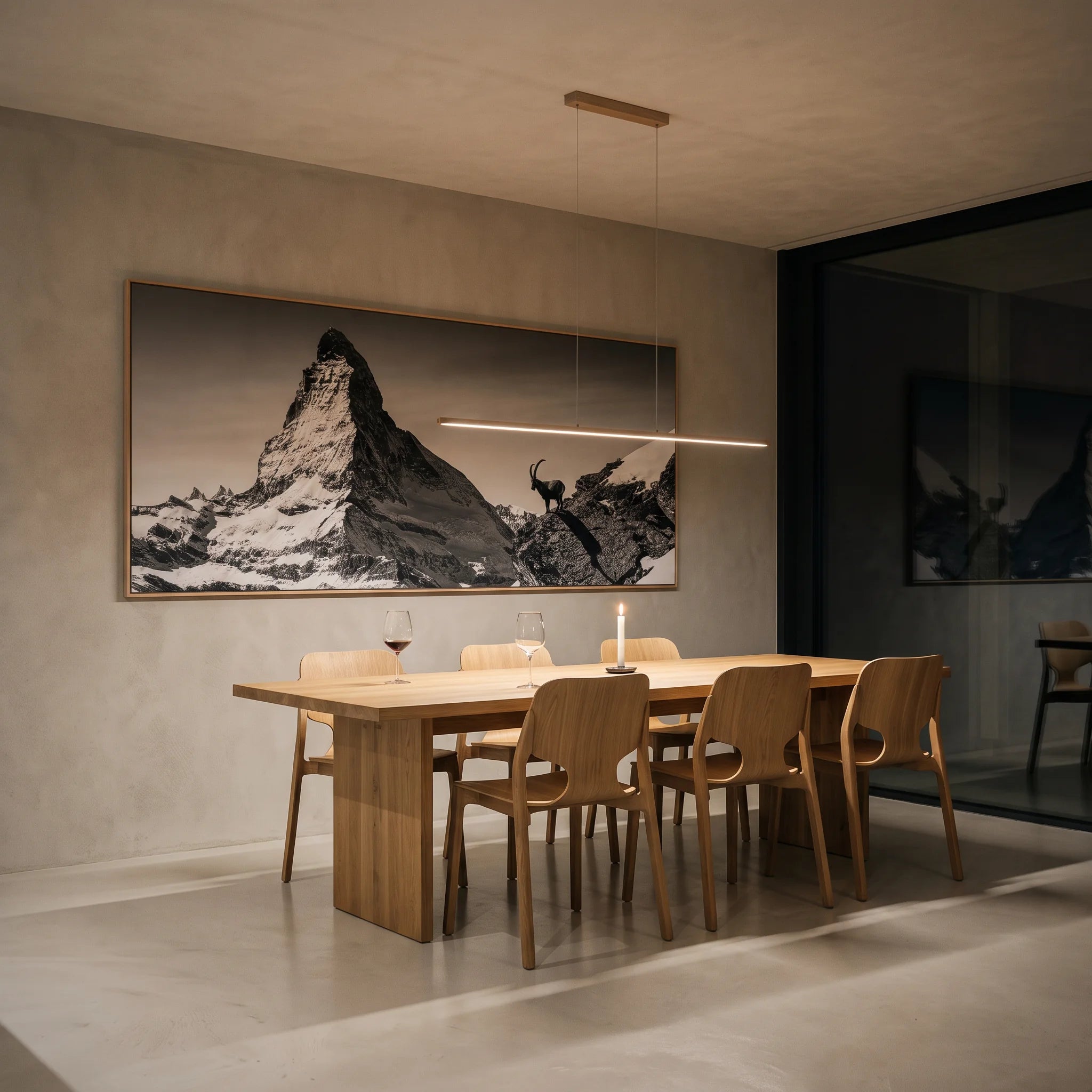 Large-Scale Alpine Wall Art depicting Ibex Before the Matterhorn in a modern dining setting.