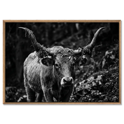 Forest Cow artwork showcasing a Swiss cow in a forest, featuring natural elements on its horns.