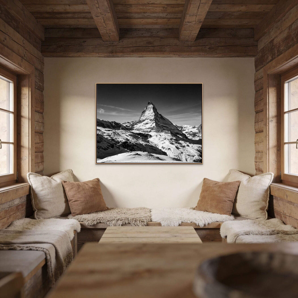 Matterhorn Eternal Contrast – Alu-Dibond wall art displayed in a cozy wooden interior with soft furnishings.