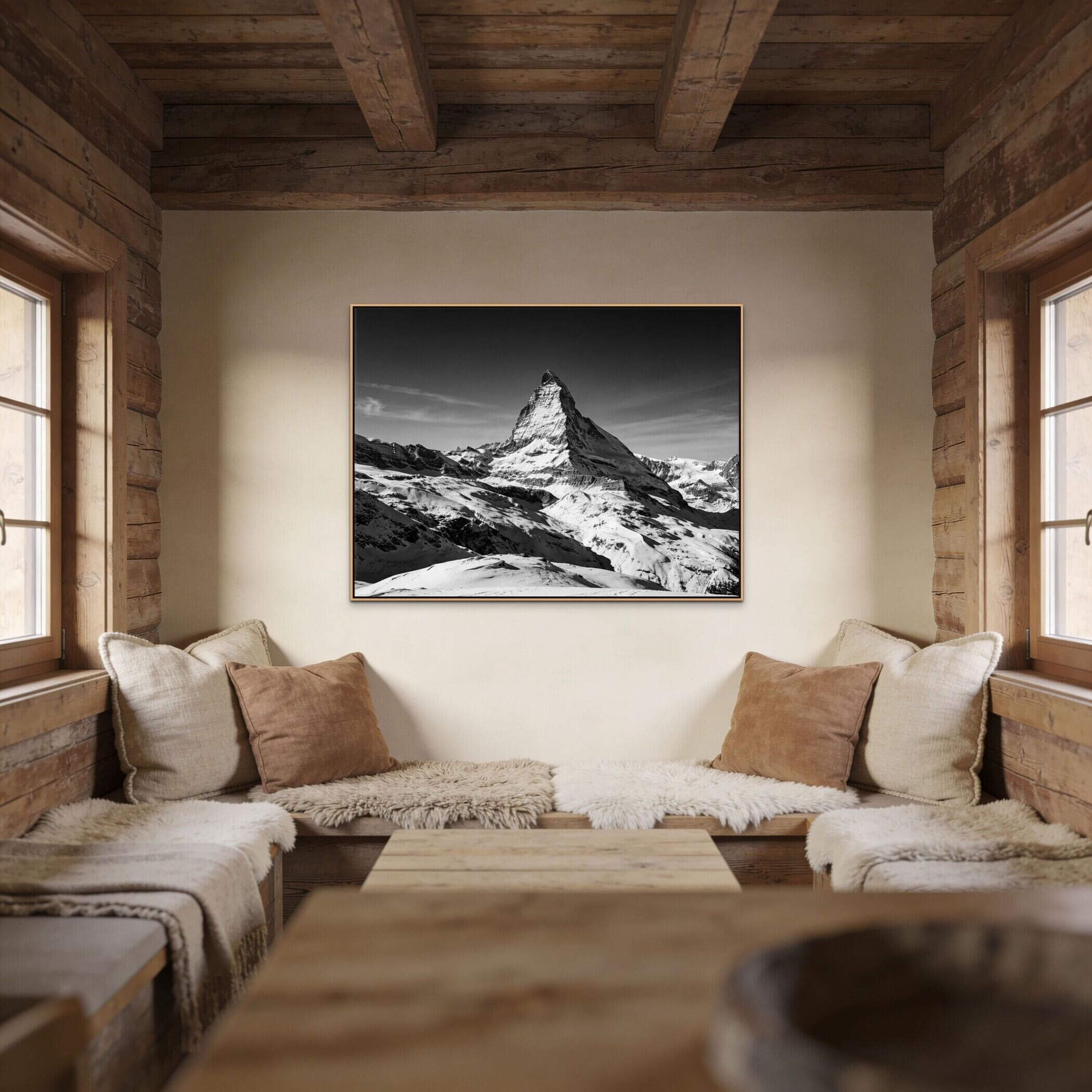 Matterhorn Eternal Contrast – Alu-Dibond wall art displayed in a cozy wooden interior with soft furnishings.
